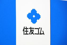 Sumitomo Rubber Industries signboard and logo